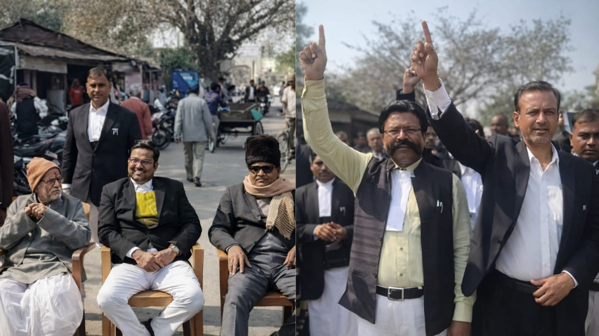 बस्ती में अधिवक्ता सुरक्षा अधिनियम लागू करने की मांग को लेकर प्रदर्शन करते वकील और सड़क पर लगा जाम।